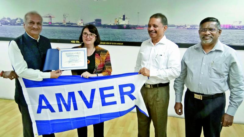 CMD of Dredging Corporation of India Ltd, Rajesh Tripathi receives AMVER Award from Consul General Katherine B. Hadda in Hyderabad on Monday. (Photo: DC)