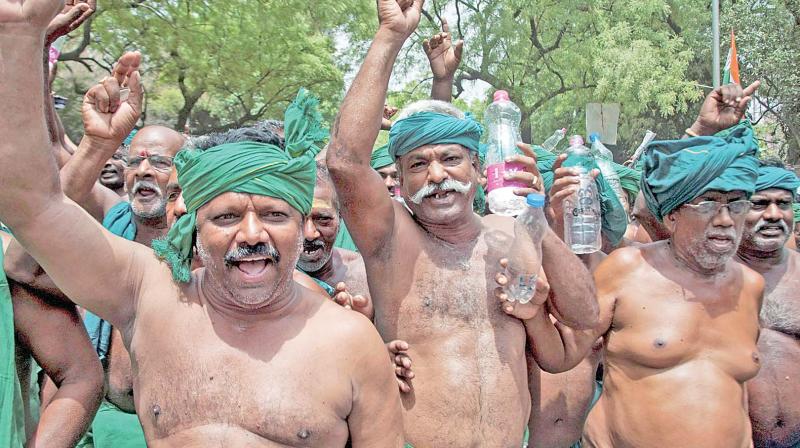 Tamil Nadu farmers shouting slogans during a protest demanding waiver of farmers loans and drought-relief funds, at Jantar Mantar in New Delhi on Saturday. (PTI)