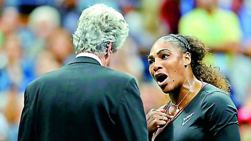 Serena Williams talks with referee Brian Earley during the US Open final