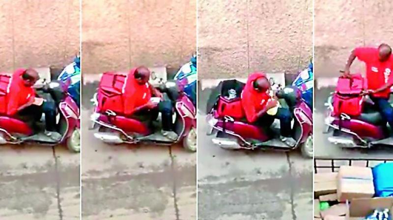 The video of the Zomato delivery personnel spotted eating from a food parcel, assumed to be of a customer.