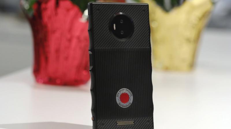 This Friday, Oct. 26, 2018, photo shows the camera on the back of the Red Hydrogen One smartphone in New York. The new Hydrogen One is launching with two major movies converted to this format and allows users to create and share their own videos shot with the phone. (AP Photo/Richard Drew)