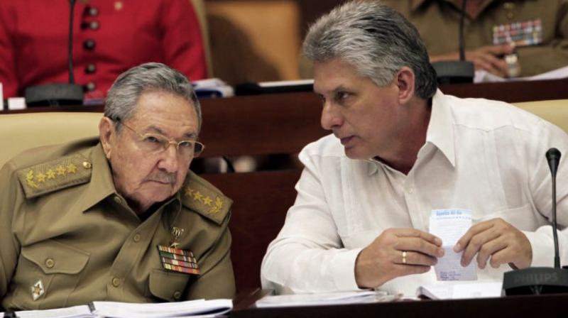 Cubas President Raul Castro and Vice President Miguel Diaz-Canel attend the opening of a twice-annual legislative sessions, at the National Assembly in Havana. (Photo: AP)