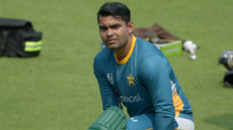 An PCB official said the show cause had been issued since Umar had breached clauses of his players contract which bars any player from talking to the media without first taking permission from the authorities.(Photo: AFP)