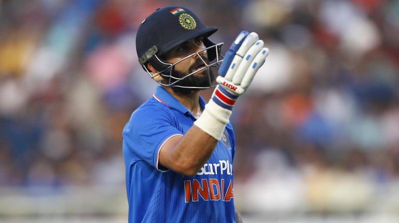 \Its just a good challenge for him (Virat Kohli) of where hes at in his career. Hes in a little bit of a flat spot but everyone goes through that, and hes well and truly good enough to find his way through the other side,\ said Ricky Ponting. (Photo: AP)