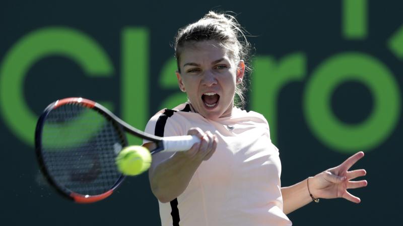 Halep, who almost joined eight other seeds eliminated on a day of upsets in south Florida, was delighted with the way she dug in and fought in the deciding third set on centre court. (Photo: AP)