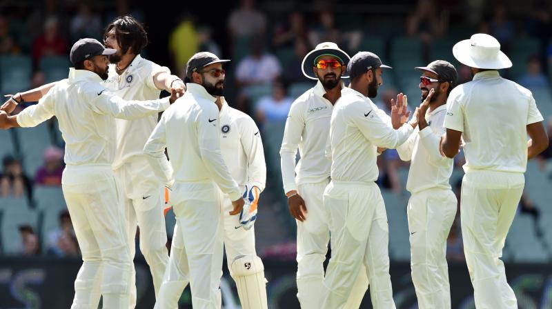 India won their first Test on Australian soil in a decade Monday, bowling out the home side in a nail-biting finale to clinch the opening match of the series at Adelaide Oval. (Photo: AFP)
