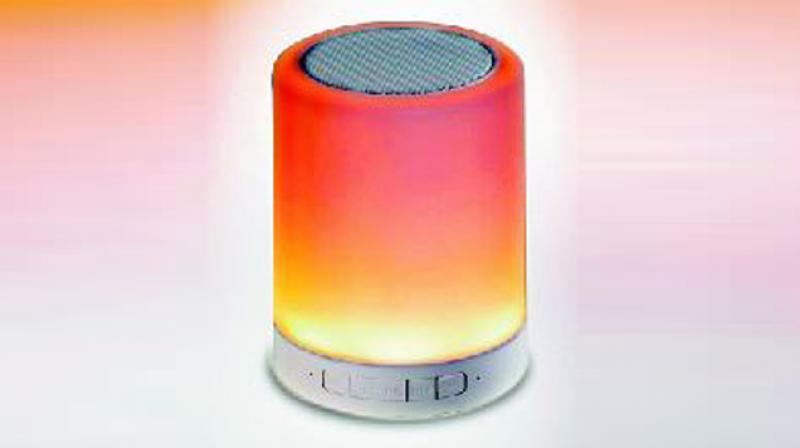 The 3-watt speaker is a chunky cylinder of sound  with the grill on top.