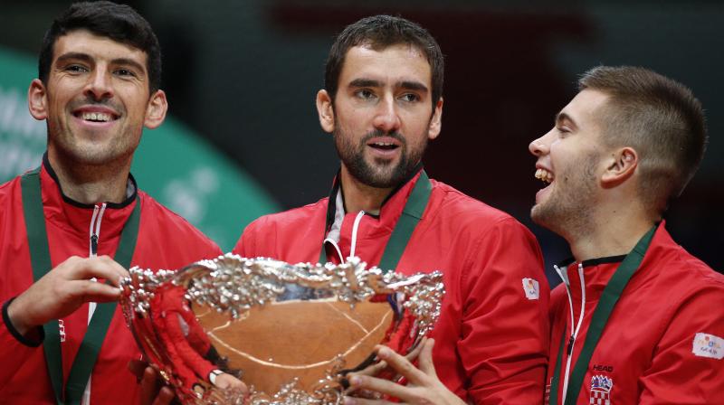 The mainly French 22,000 crowd kept roaring their support for Pouille, but it was the Croatia contingent, decked out in their distinctive red and white, who would soon be celebrating. (Photo: AP)