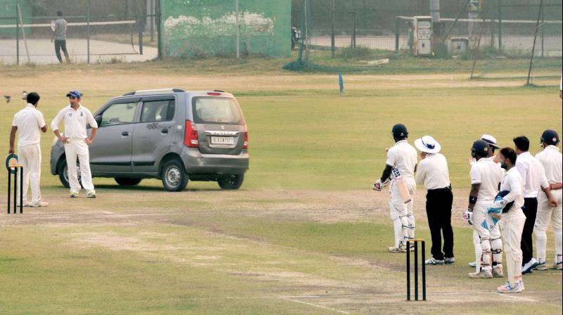 On day three of the Ranji Trophy encounter, one man identifying himself as Girish Sharma had breached the security at the Airforce ground and was allegedly in an inebriated state when he drove his car onto the pitch. (Photo: PTI)