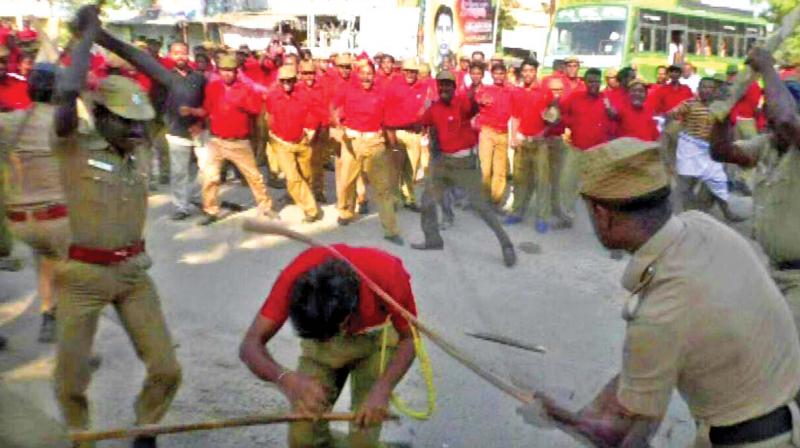 Clash between cops and red shirt wearing volunteers of the CPM on the final day of the 22nd state conference of the CPM in Thoothukudi on Tuesday. (Photo: DC)