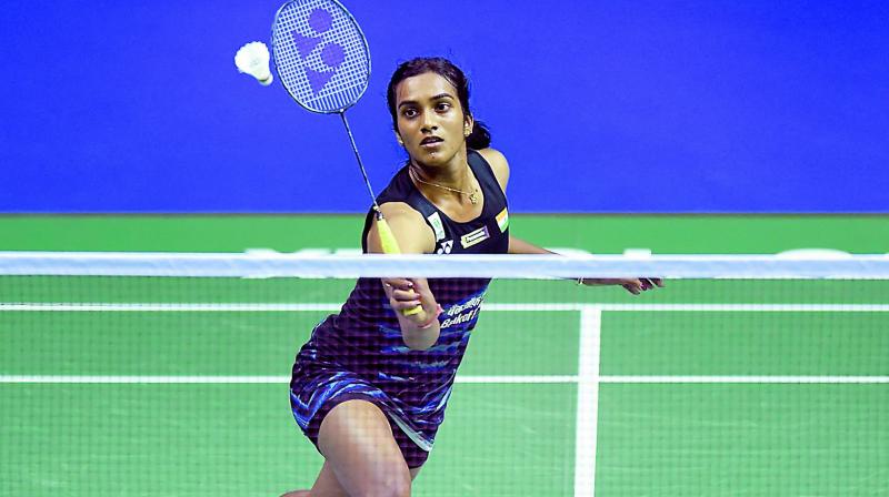 P. V. Sindhu returns a shot to Cheung Ngan Yi of Hong Kong during their womens singles pre-quarterfinal match at the World Badminton Championships in Glasgow, Scotland on Thursday. Sindhu won 19-21, 23-21, 21-17. (Photo: AFP)