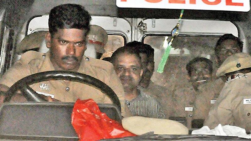 Perarivalan moves out of prison in police vehicle. (Photo: DC)