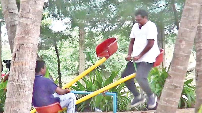 MLAs playing seesaw at the resort. (Photo: DC)
