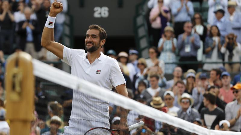 Marin Cilic celebrates after beating Luxembourgs Gilles Muller at the end of their Mens Singles Quarterfinal Match. (Photo:AP)