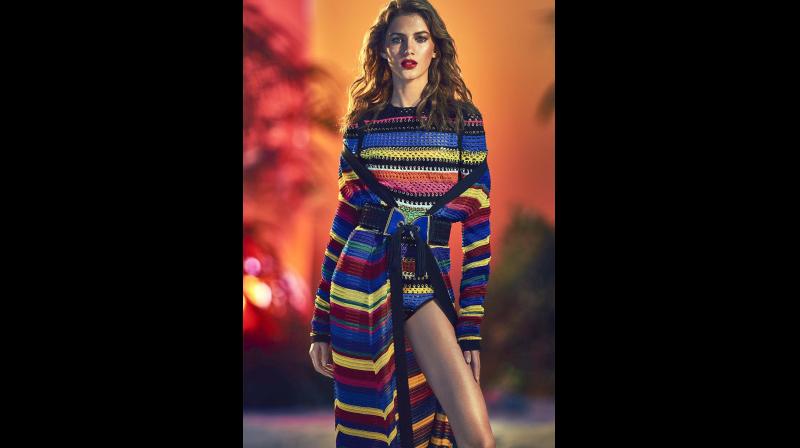 An international model sets the temperatures soaring in this multi-hued ensemble.