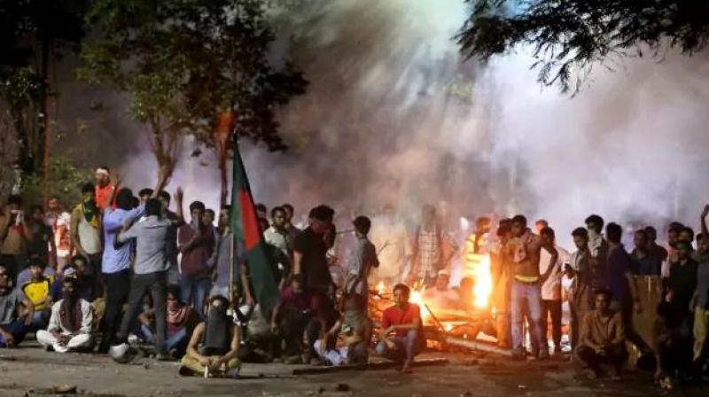 Organisers in Dhaka said they were holding peaceful protests when police started firing tear gas and rubber bullets. They used batons and water cannon to clear a central square. (Photo: AFP)