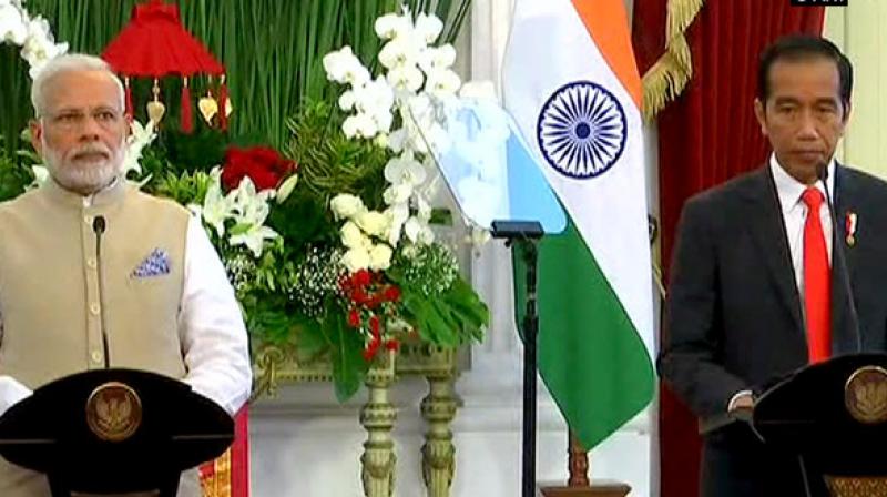 India and Indonesia on Wednesday announced the signing of a Memorandum of Understanding (MoU) between Confederation of Indian Industry and KADIN to promote bilateral economic, trade and technological cooperation between the two nations. (Photo: ANI)