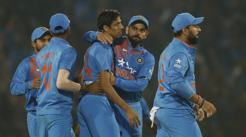 Although India seemed to have posted a relatively low total, some tight bowling from Bumrah and Nehra, helped them restrict england to 139.. (Photo: AP)