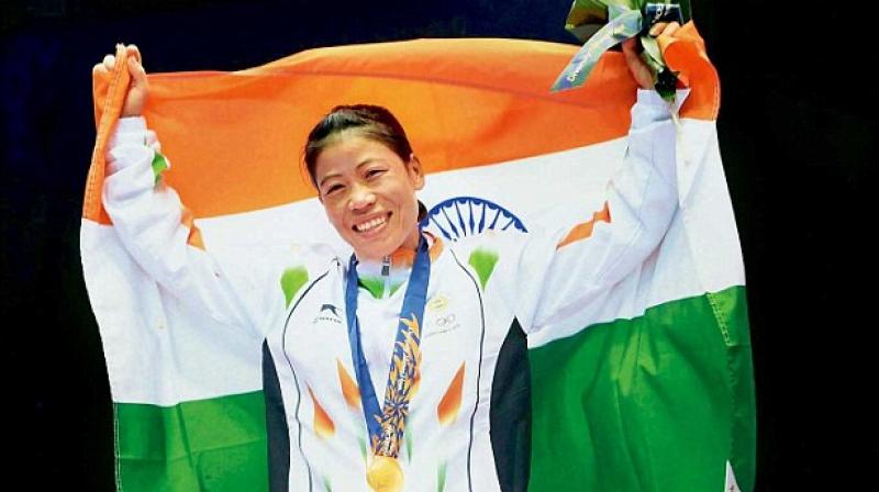 MC Mary Kom had booked her place in the finals of Asian Womens Boxing Championships after sweeping aside Japans Tsubasa Komura in the light-flyweight category in the Ho Chi Minh City on Tuesday.(Photo: PTI)