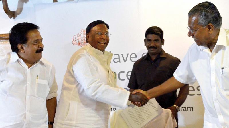 Opposition leader Ramesh Chennithala, Puducherry Chief Minister V. Narayanaswamy and Chief Minister Pinarayi Vijayan during a conclave of finance ministers of South Indian states in Thiruvananthapuram on Tuesday. (Photo: Peethambaran Payyeri)