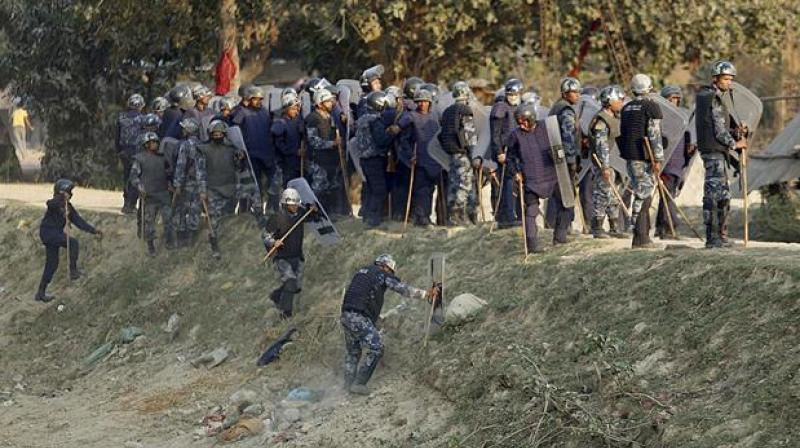 Nepalese police clash with Madhesi minority protesters at Rajbiraj (Photo by AFP)