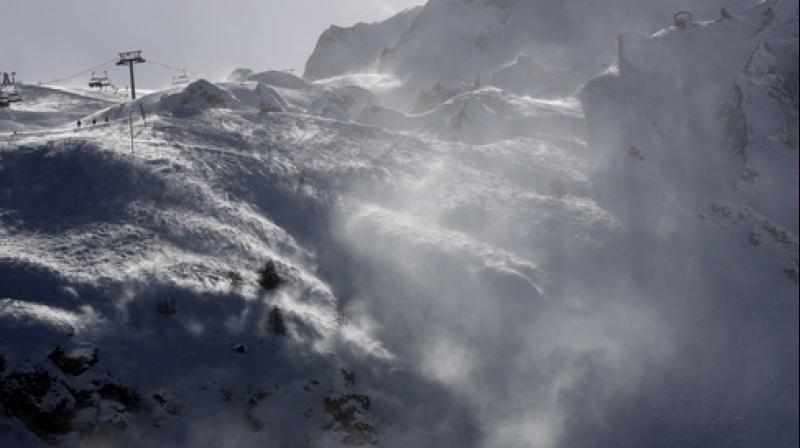 French officials say an avalanche has struck the Alpine ski resort of Tignes