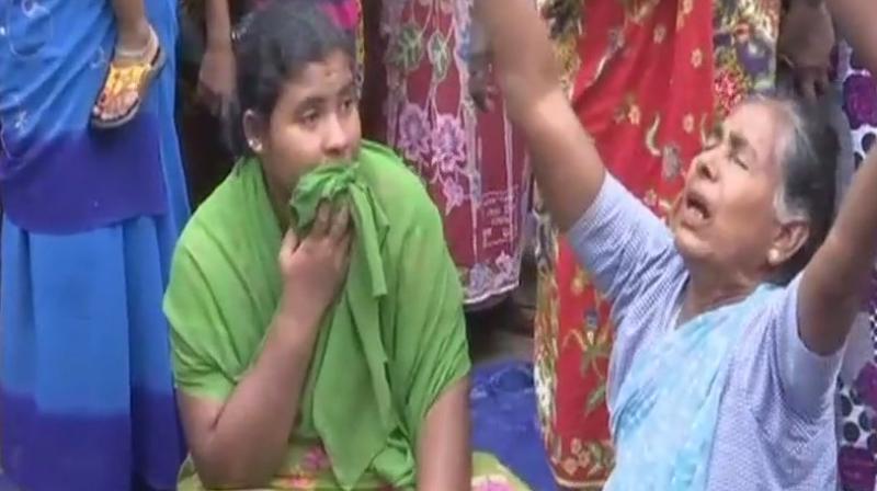 Relatives of missing fishermen mourn in Thiruvananthapuram, say they received no warnings of cyclone Ockhi from the government. (Photo: ANI/Twitter)