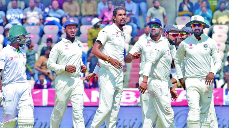 Virat Kohli with his team.