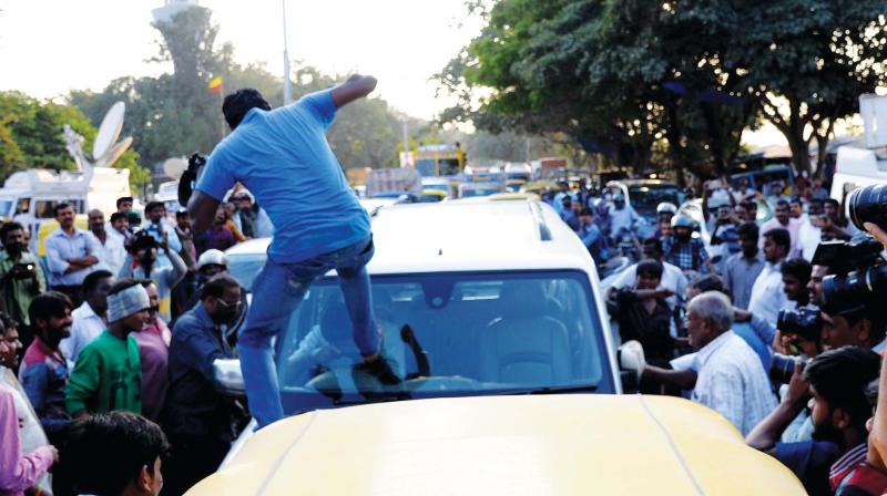 One of the convoys of AIADMK general secretary V.K. Sasikala attacked in Bengaluru on Wednesday. (Photo: DC)