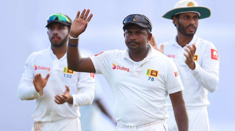 Last man out was silver fox Rangana Herath, crickets most successful left-arm spinner in history, in his last match before retirement. (Photo: AFP)