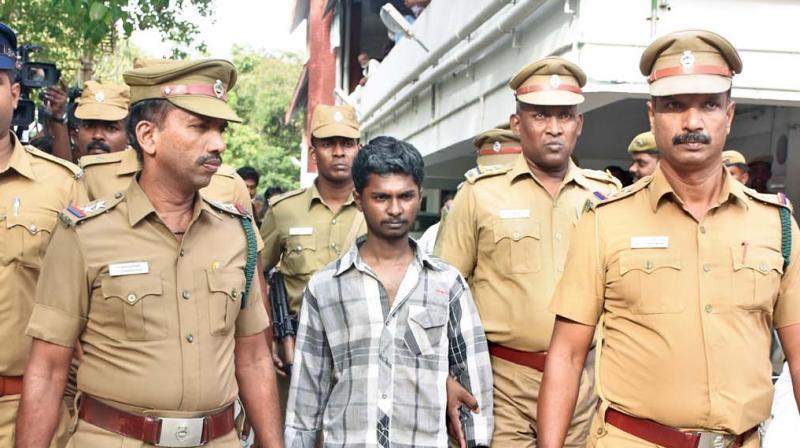 The accused, in the murder of Chennai techie Swathi (right) in Nungambakkam railway station, during a court appearance. (Photo: DC)