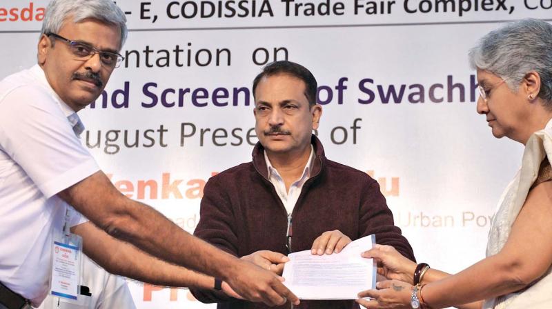 The Union Minister of State, Rajiv Pratap Rudy receiving the memorandum from industrial associations in Coimbatore on Wednesday. (Photo:  DC)