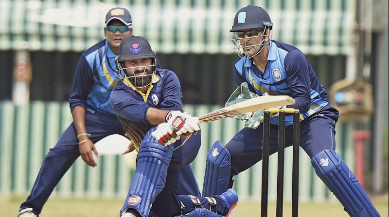 Parvez Rasool (batting), the first cricketer from Jammu and Kashmir to play for senior national team and states only representative in the cash-rich IPL, is hurt that cricketers from the region dont even get basic facilities for top level cricket. (Photo: PTI)