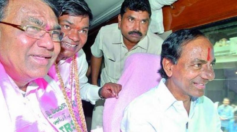 Chief Minister K. Chandrasekhar Rao with Minister for agriculture Pocharam Srinivas Reddy. (File photo)