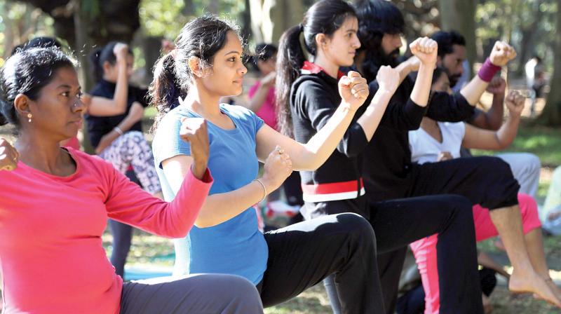 Women at a workshop on self defence organised by Grand Master Akshar in Cubbon Park on Sunday. (Photo: DC)