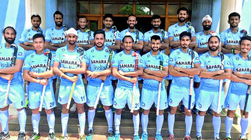 Members of the Indian hockey team pose in Bengaluru on Thursday.