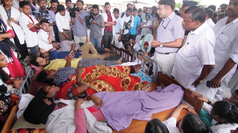 District Collector Amit Meena meets striking students of the Manjeri Medical College at the protest venue on Thursday (Photo: DC)