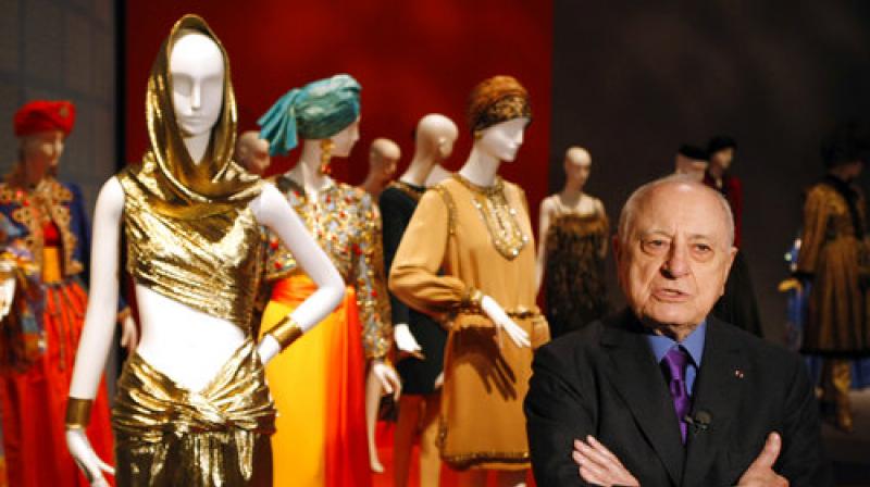 In this March 8 2010 file photo, French fashion businessman and former Saint Laurent partner, Pierre Berge stands among late French fashion designer Yves Saint Laurents creations as part of Yves Saint Laurent exhibition in Paris. (Photo: AP)