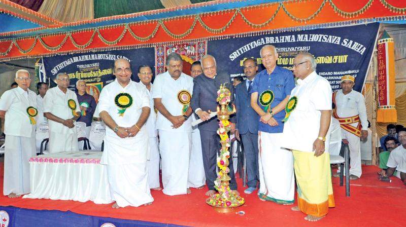 Governor Banwarilal Purohit,  inaugurates the 171st  aradhana of saint composer Sri Thyagaraja at Thiruvaiyaru on Tuesday. (Photo: DC)