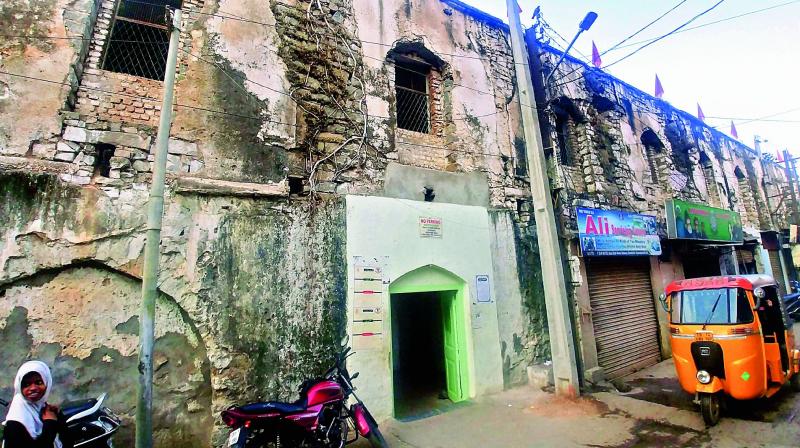 Plaster from walls of the historic Darulshifa hospital peeled off while some portions collapsed. 	(Image: DC)