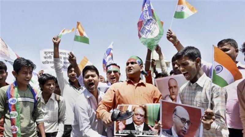 LJP activists protest against death sentence to Kulbhushan Jadhav by Pakistani military court, in Patna on Tuesday. (Photo: PTI)