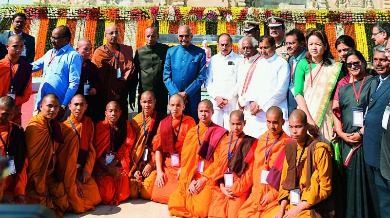 President Ram Nath Kovind pays floral tributes at the statue of the Lord Buddha at the Tank Bund before visiting the Raj Bhavan Government School. (Photo: DC)