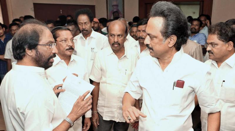 After presiding over his party MLAs meeting, DMK Working President M K Stalin is seen having a word with MP Trichy Siva on Sunday. (Photo: DC)