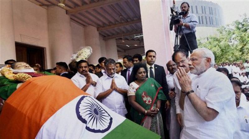 Prime Minister Narendra Modi pays his last respects to Tamil Nadus former Chief Minister Jayaram Jayalalithaa at Rajaji Hall in Chennai. (Photo: PTI)