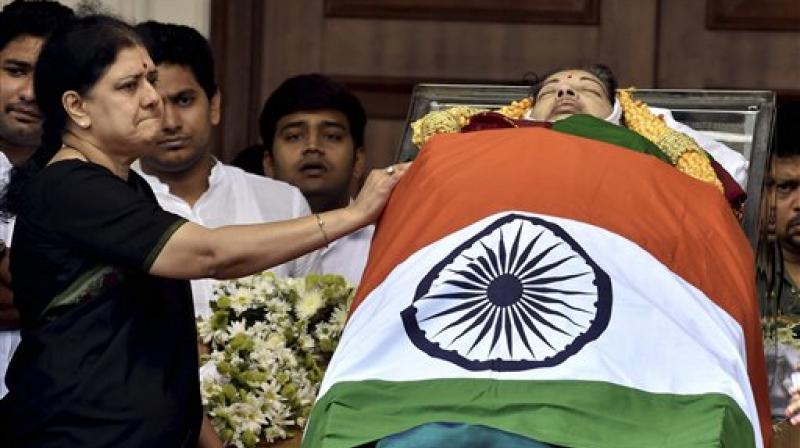 V Sasikala, the close aide of Tamil Nadus former Chief Minister Jayaram Jayalalithaa near her mortal remains. (Photo: PTI)
