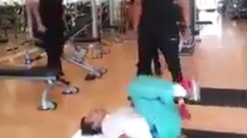 A video grab of Imran Khan doing crunches at the gym