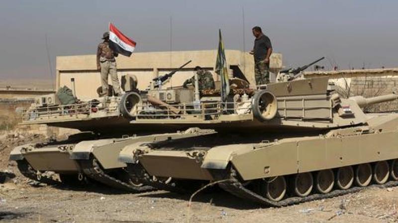 Iraqi forces are deployed during an offensive to retake Mosul from Islamic State militants outside Mosul. (Photo: AP)