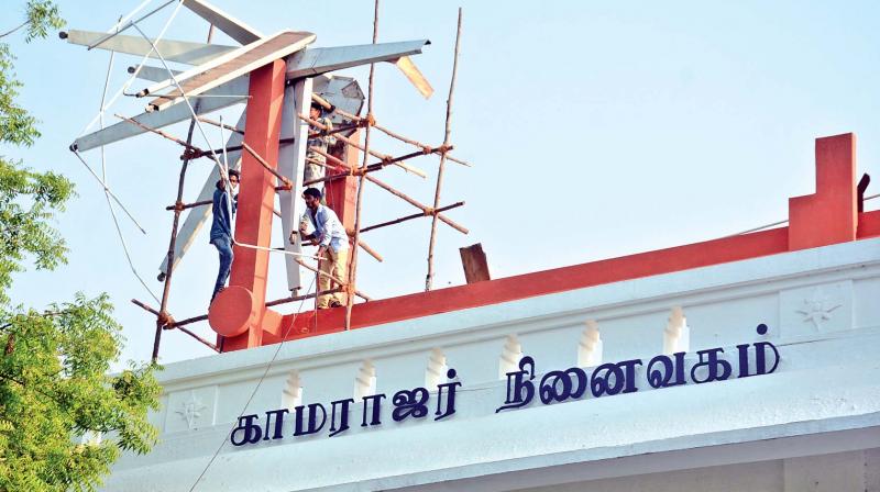 Deccan Chronicle published how Vardah had destroyed the model of spinning wheel atop the Kamarajar Memorial at Adyar.  Now, work is underway to repair it. (Photo: DC)