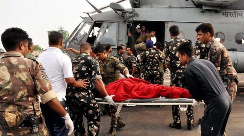 Injured pilgrims and passengers being taken to hospital by the rescue team of IAF at Air Force Station Jammu on July 16, 2017. At least 16 Amarnath pilgrims were killed and around 30 others injured when their bus skidded off the Jammu-Srinagar national highway and rolled down into a deep valley. (Photo: PTI)
