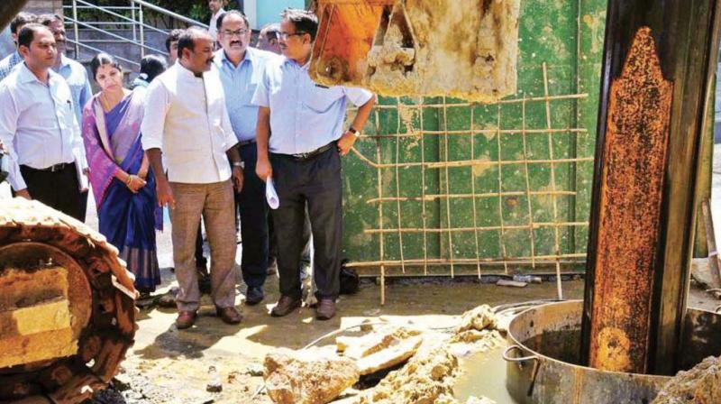 Mayor Sampath Raj on Wednesday paid a surprise visit to the BBMP west zone to find out if all the pourakarmikas were working, but the civic workers bombarded him with complaints of their salaries still not being paid.